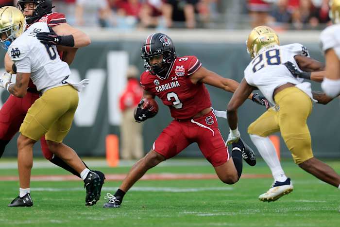 South Carolina Gamecocks wide receiver Antwane Wells Jr. (3) rushes for yards against Notre Dame Fighting Irish cornerback TaRiq Bracy (28) during the first quarter of the TaxSlayer Gator Bowl of an NCAA college football game Friday, Dec. 30, 2022 at TIAA Bank Field in Jacksonville. The Notre Dame Fighting Irish held off the South Carolina Gamecocks 45-38. [Corey Perrine/Florida Times-Union] Jki 123022 Ncaaf Nd Usc Cp 71  